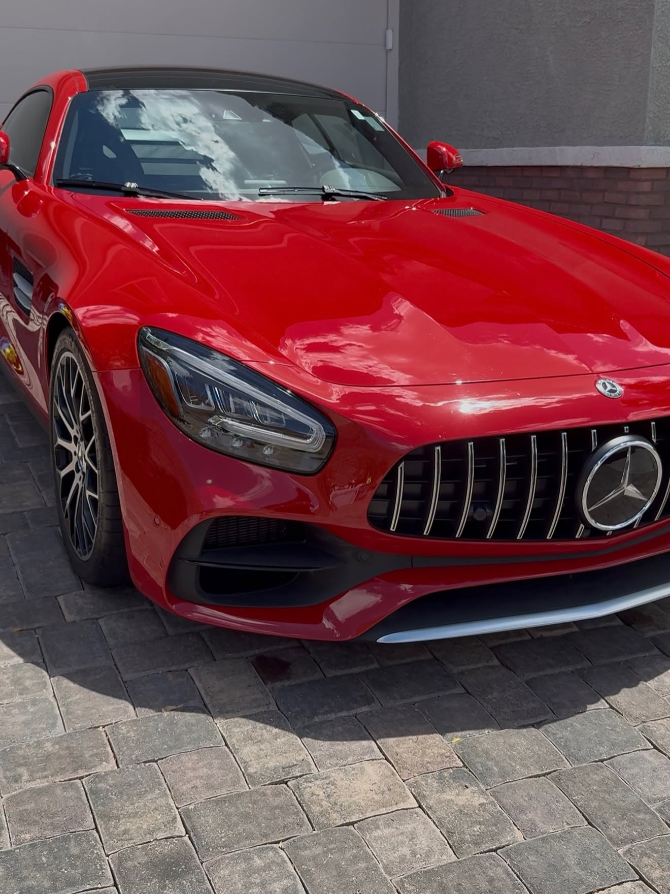 Red Mercedes-AMG GT R with a polished exterior